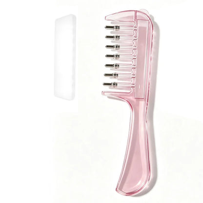 A translucent pink plastic hair comb with multiple fine metal teeth, shown alongside a small white rectangular accessory on a plain white background.