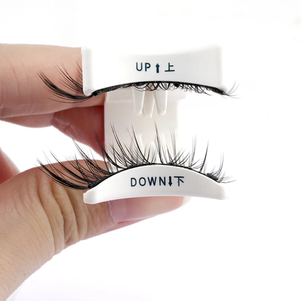 False eyelashes with 'UP' and 'DOWN' labels held by a hand, branded 'Lanjinglin'.