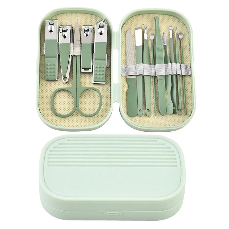Green manicure set with tools in an open case on a white background