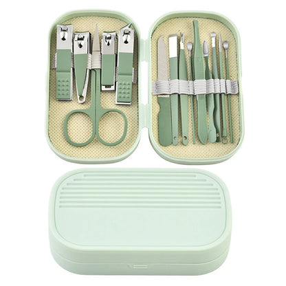 Green manicure set with tools in an open case on a white background