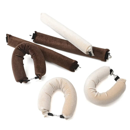 Set of brown and beige inflatable neck pillows on a white background