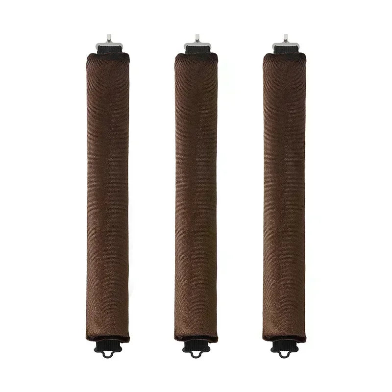 Three brown cylindrical objects with black bases on a white background