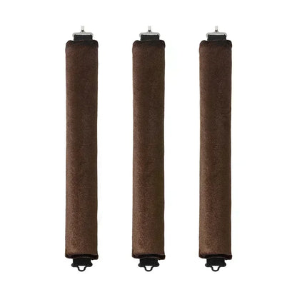 Three brown cylindrical objects with black bases on a white background