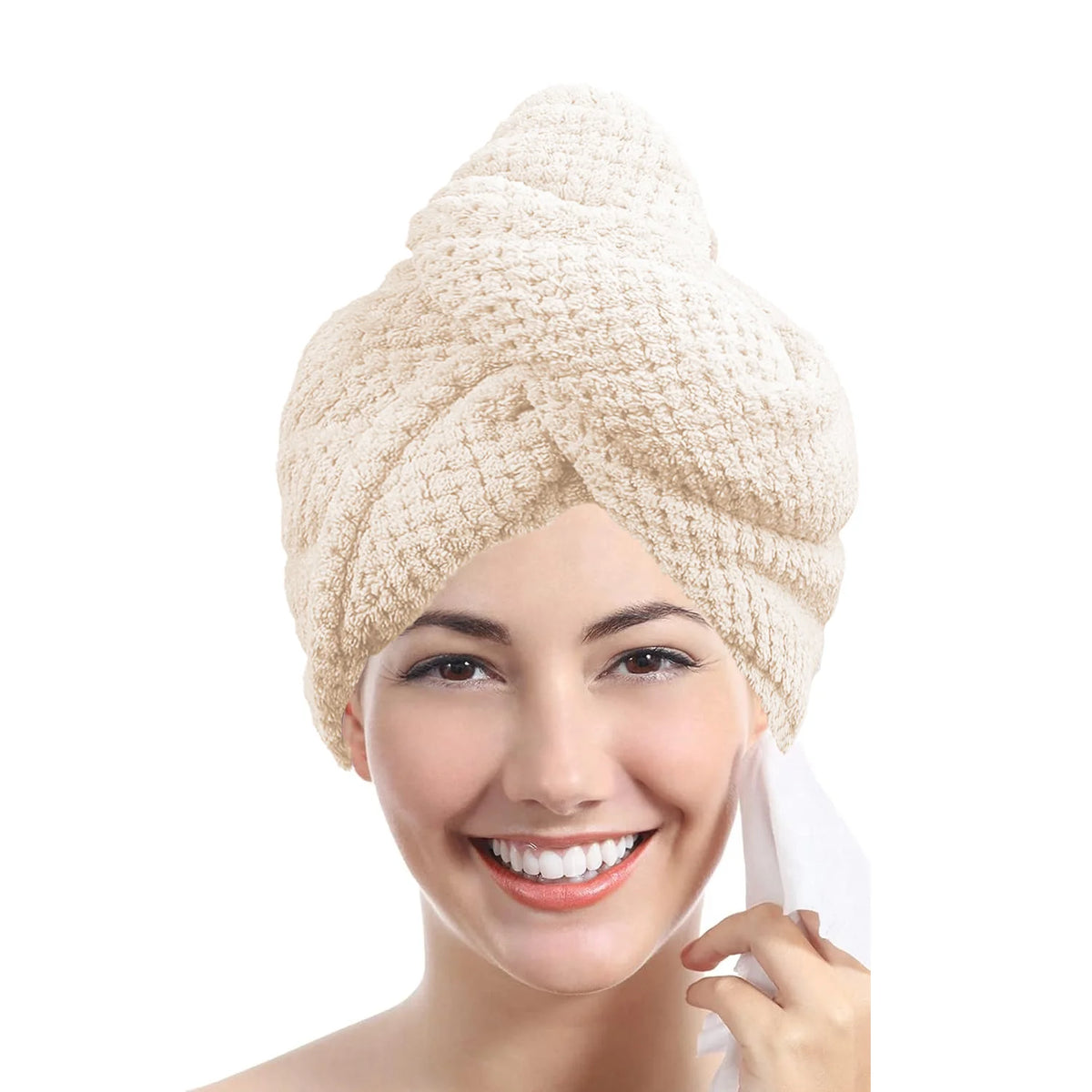Woman wearing a beige hair turban on a white background