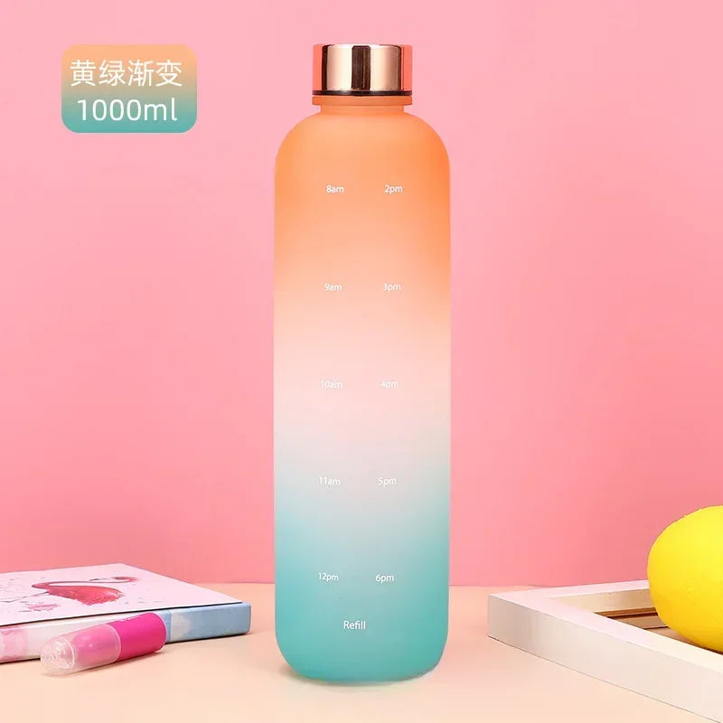 Gradient water bottle with measurement markings on a pink background