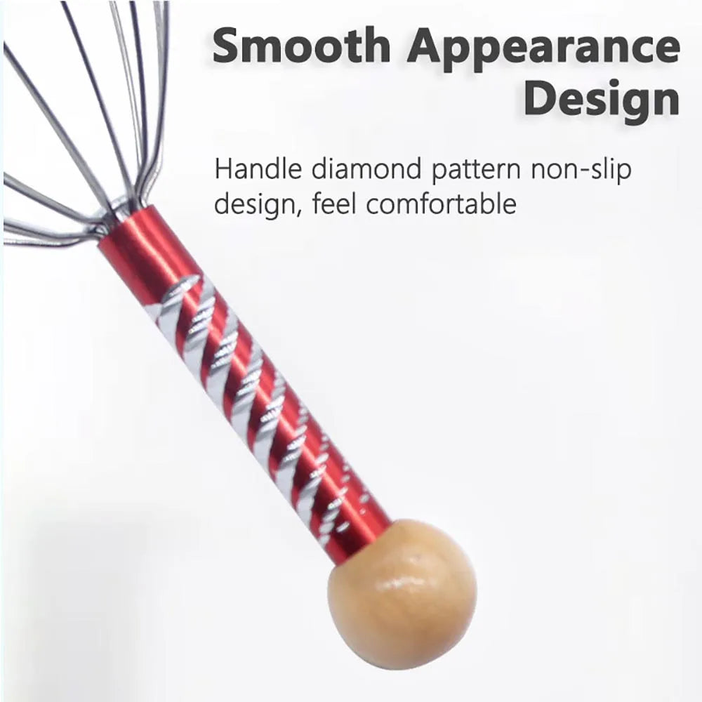 whisk with wooden handle on a white background